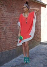 Coral dress in combination with green