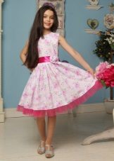 Elegant dress for a girl of 8-9 years with a print