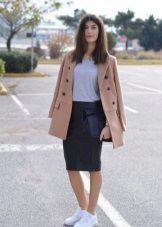A pencil skirt combined with sneakers
