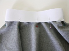 Banda elástica para un cinturón de media falda