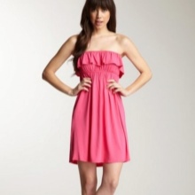 Short pink viscose dress with frill on the chest