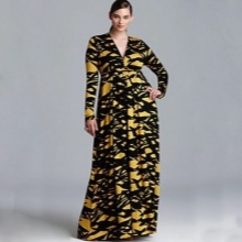 Vestido largo amarillo y negro con escote profundo y manga larga