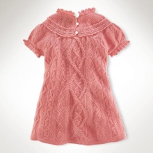 Knitted dress for girls with knitting needles with braids