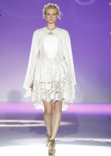 Openwork wedding dress with a cape
