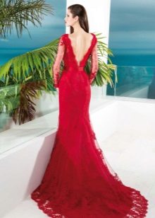 Red evening dress with an open back and a train