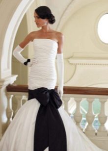 Wedding dress with a black bow