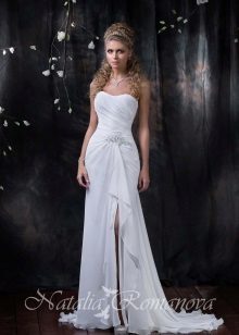 Wedding dress from the EUROPE COLLECTION collection with a slit