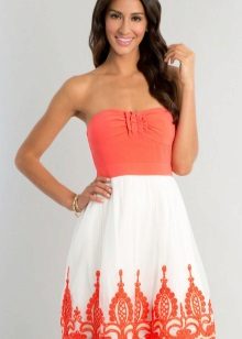 Coral dress in combination with white