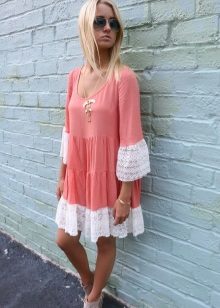 The combination of white and coral in a dress