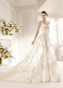 Wedding dress with flowers in tone with translucency