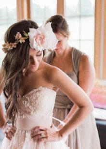 Wedding dress with flowers on the neckline