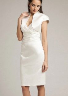 Strict wedding dress sheath of medium length in combination with a ballerina