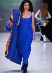 Coat for a blue dress on the floor