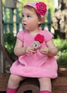 Knitted dress for girls with knitting needles pink