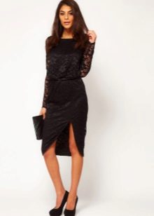 Asymmetric skirt and black clutch