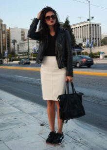 Straight skirt combined with a leather jacket