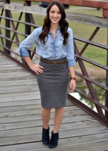 Gray pencil skirt with leather strap and denim shirt