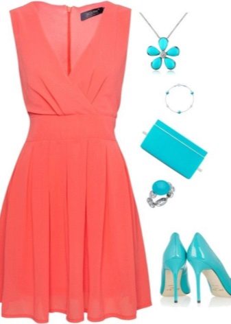 Coral dress combined with turquoise accessories