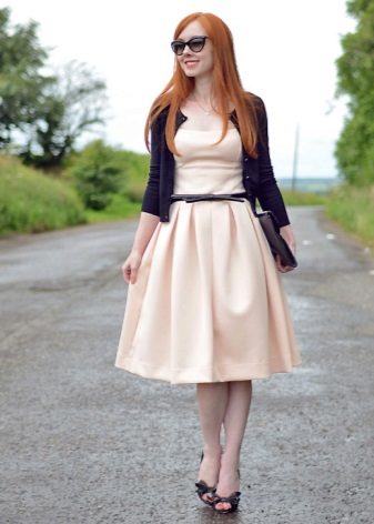 Beige casual dress with a black strap