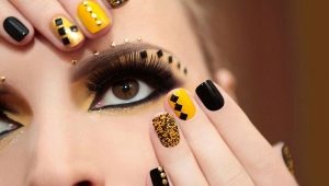 Manicure hitam dan kuning: idea yang cerah dan tidak biasa
