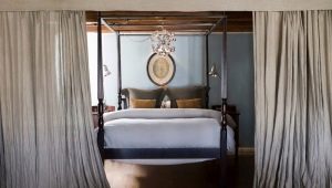 La suddivisione in zone della camera da letto con tende: caratteristiche e opzioni interessanti