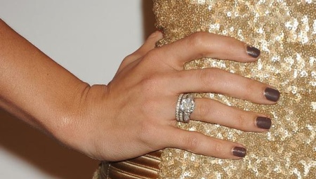 On which finger are the engagement ring worn?