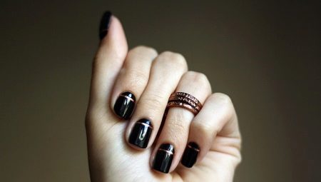 Design and decor of dark manicure
