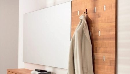 Cangkuk dinding untuk pakaian di lorong: apa dan bagaimana untuk memilih?