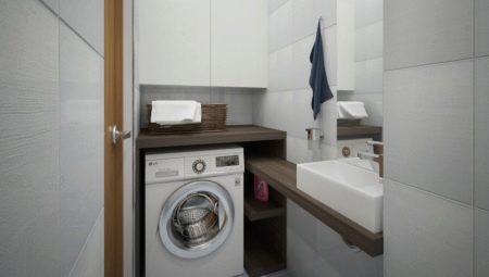 Skapji virs veļas mazgājamām mašīnām vannas istabā