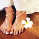 We choose the design of a white pedicure with rhinestones