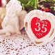Qual é o nome do aniversário de casamento após 35 anos e o que é dado a ele?