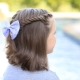 La scelta di acconciature per una ragazza della scuola con i capelli corti