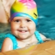 قبعة مطاطية للأطفال للمسبح: الوصف والأنواع والاختيار