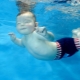 سروال سباحة للأطفال للمسبح: الوصف والأنواع والاختيار