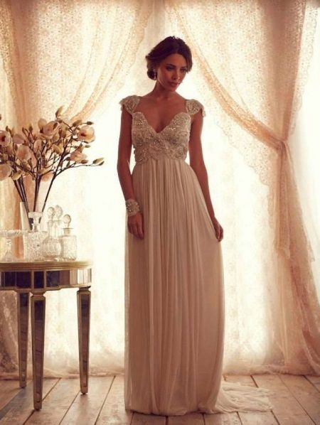 Wedding dress with a pointed pear bodice