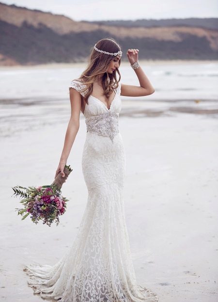 Empire style wedding dress with a train